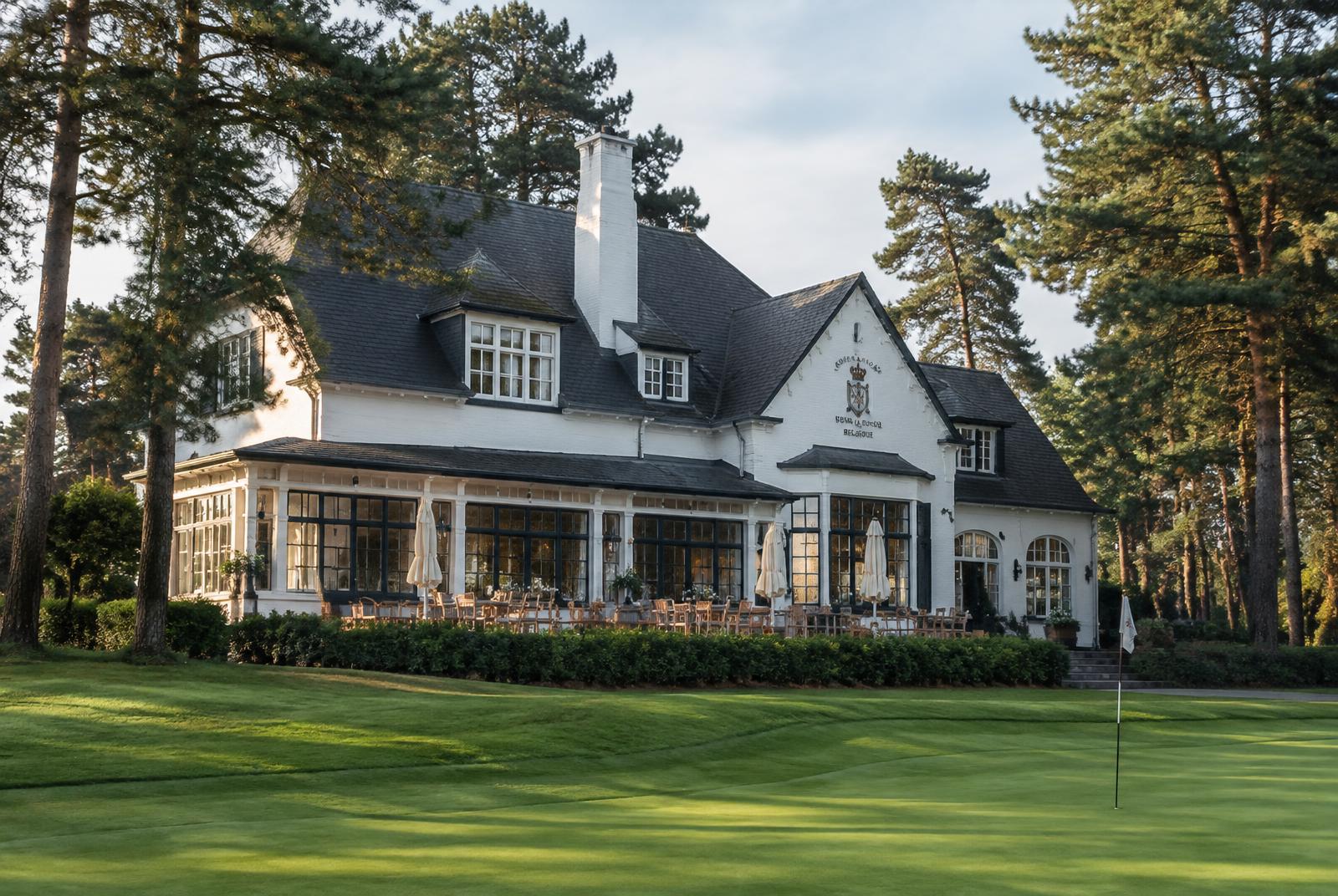 The white clubhouse among the pines